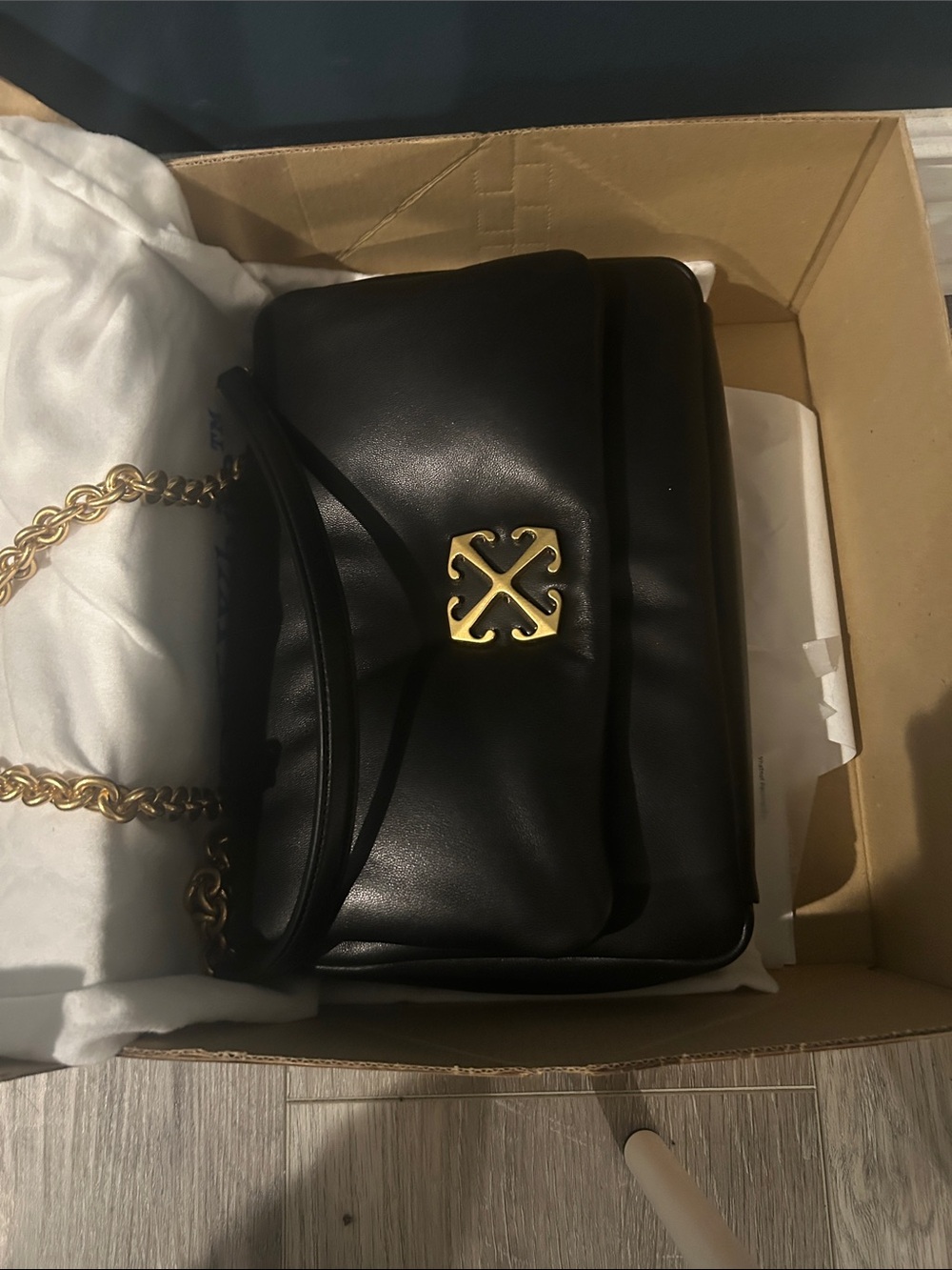 Black Leather Shoulder Bag with Gold Hardware.   Off white